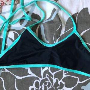 Black & turquoise swim suit top.